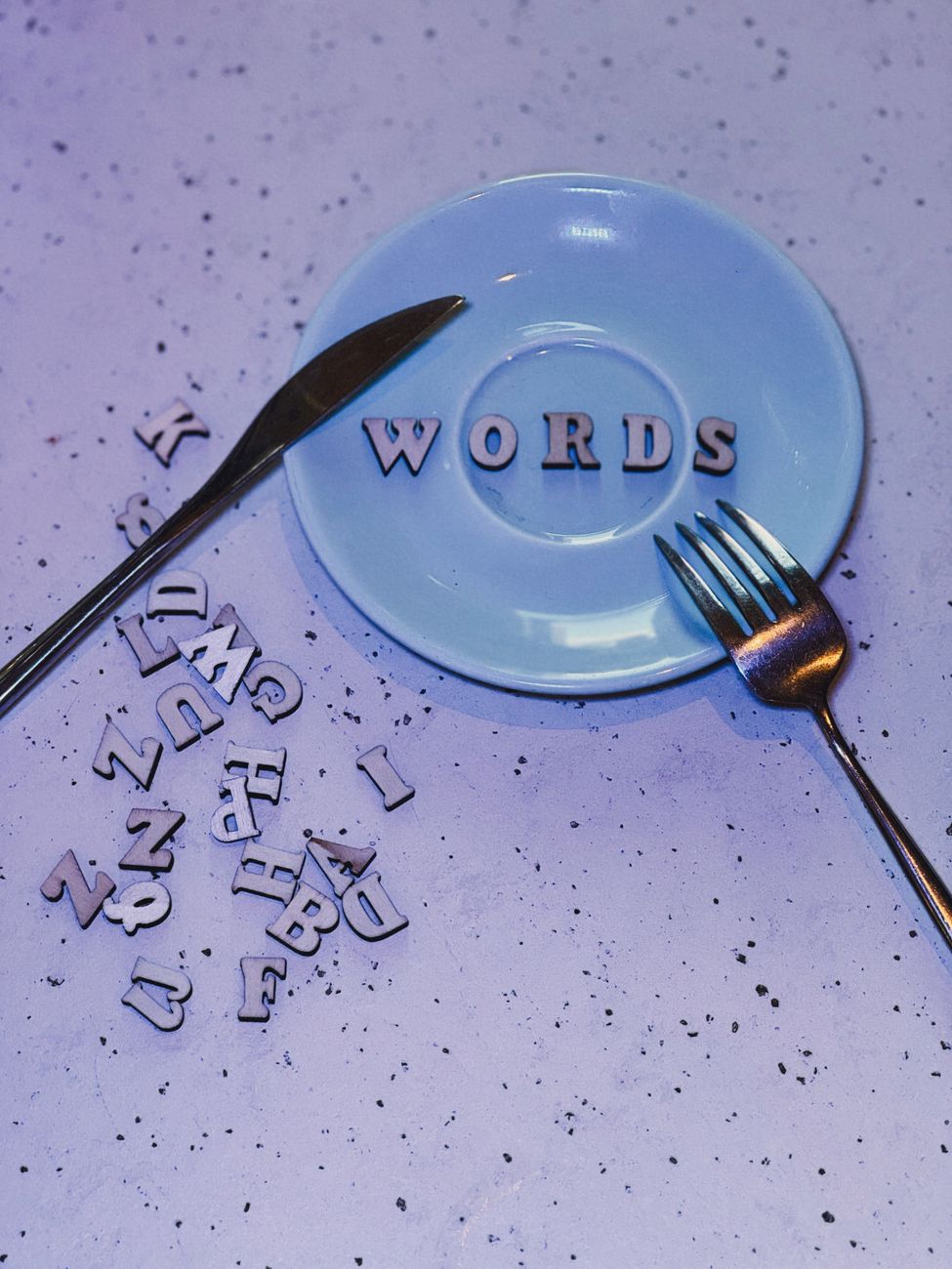 creative alphabet art with words on plate
